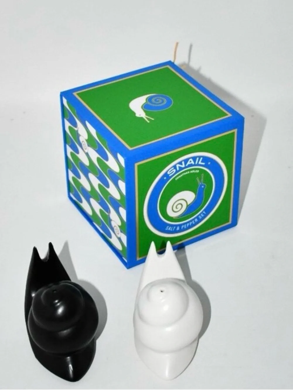 NEW IN BOX JONATHAN ADLER SNAIL SALT AND PEPPER SHAKERS WHITE AND BLACK